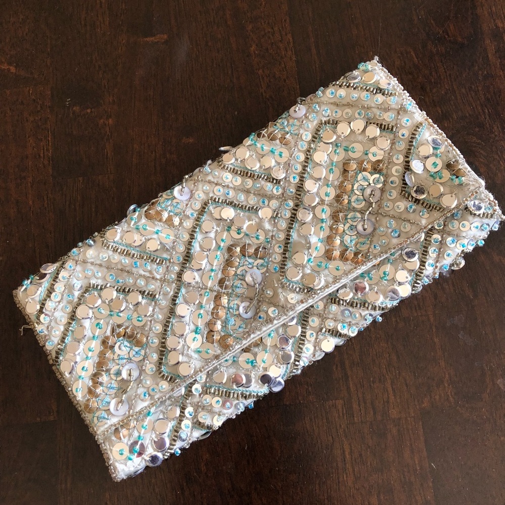 Accessorize clutch with beads, shimmers & glitters